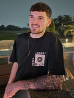 Load image into Gallery viewer, Model wearing Honour and Harmony hunter green oversized men’s t-shirt round neck half sleeves, organic cotton 210 GSM. Relaxed and casual fashion