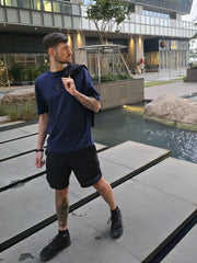 House of SwaSha navy blue oversized men’s t-shirt side profile on model demonstrating drape and length