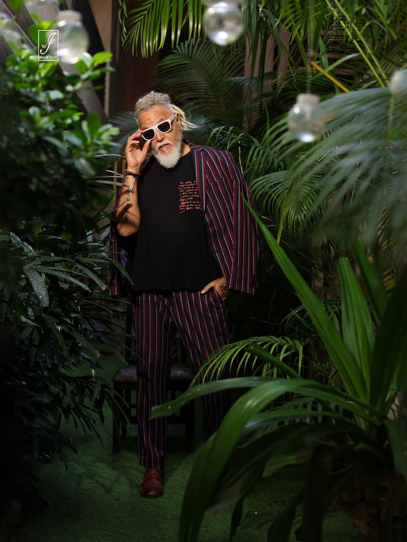 Model wearing Spirited Soul The Monk charcoal black oversized men’s t-shirt showing drape and length