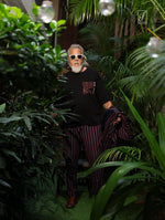 Load image into Gallery viewer, Spirited Soul The Monk charcoal black oversized men’s t-shirt front view on model, round neck half sleeves